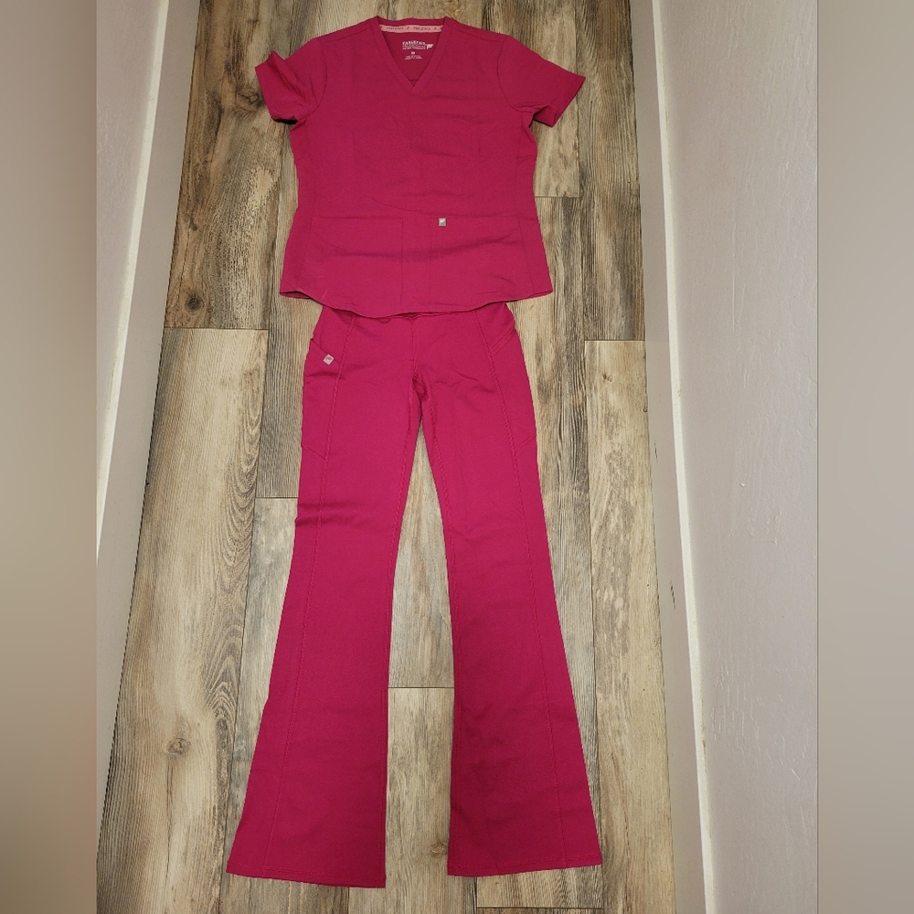 Fabletics Women's Boot Cut Scrub Set in Bright Pink